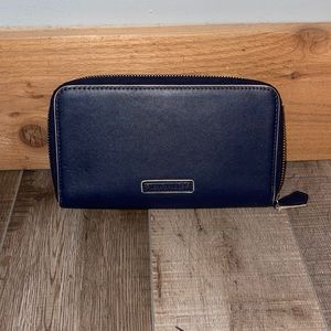 Vera Bradley navy blue and cream piping wallet. Sizing: 8”W x 5”H x opening 5”.